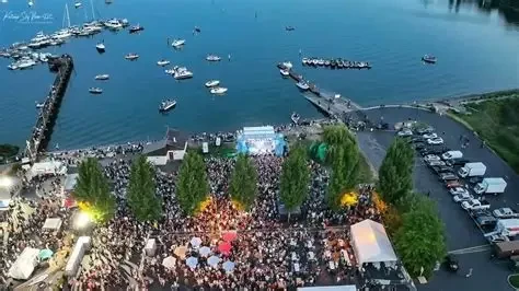 Aerial view of the waterfront crowd, marina, and boats at Silverdale Whaling Days