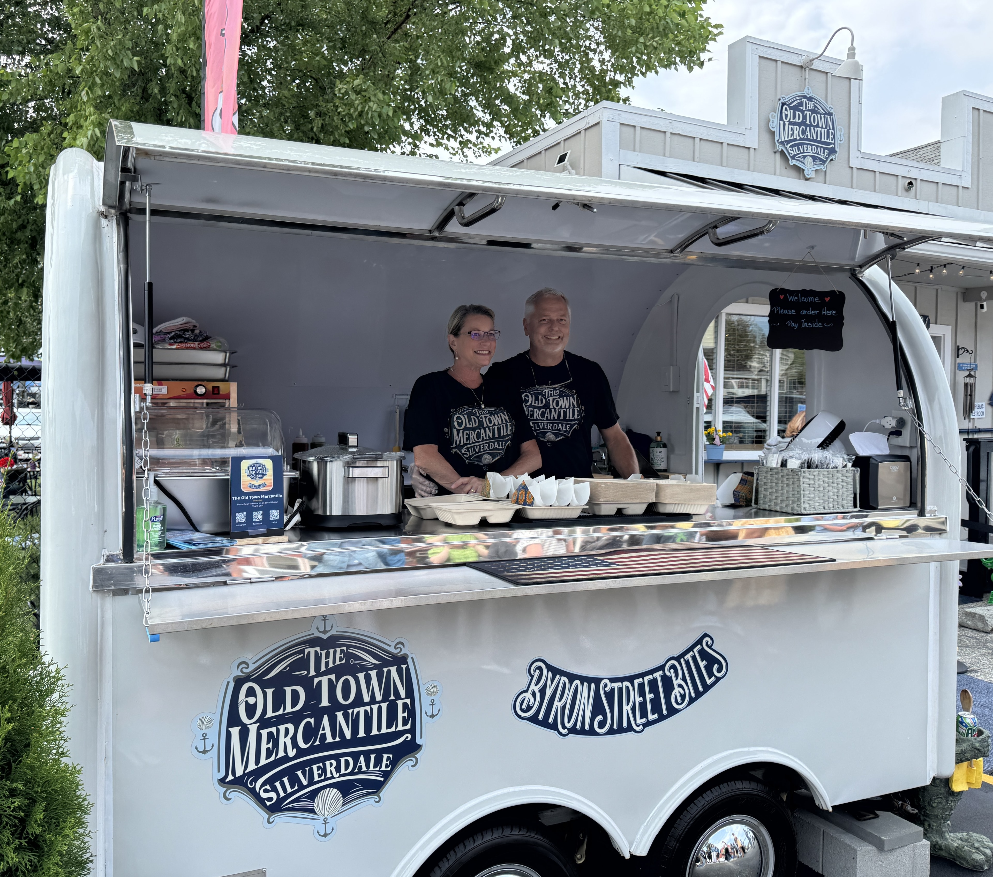 Teri and Brett Dean, owner-operators of Byron Street Bites, in their food trailer
