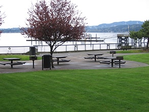 Picnic tables and waterfront lawn at Silverdale Waterfront Park